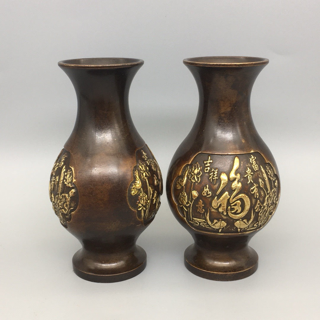 A pair of Chinese antique pure copper lucky character vases