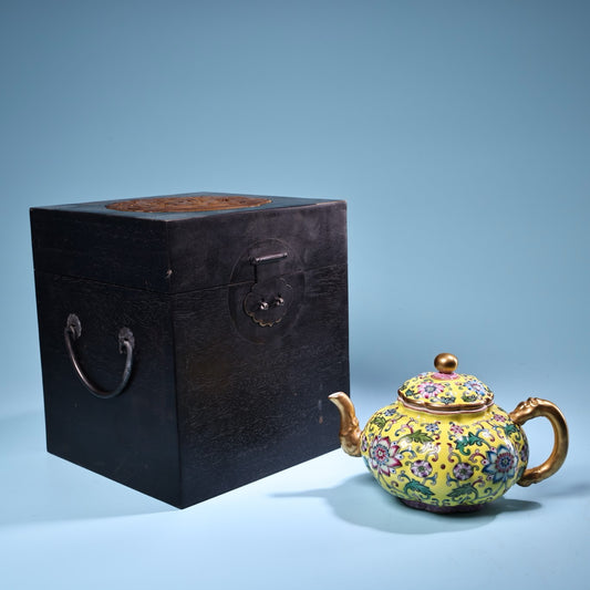 Enamel gilded gold colored porcelain teapot