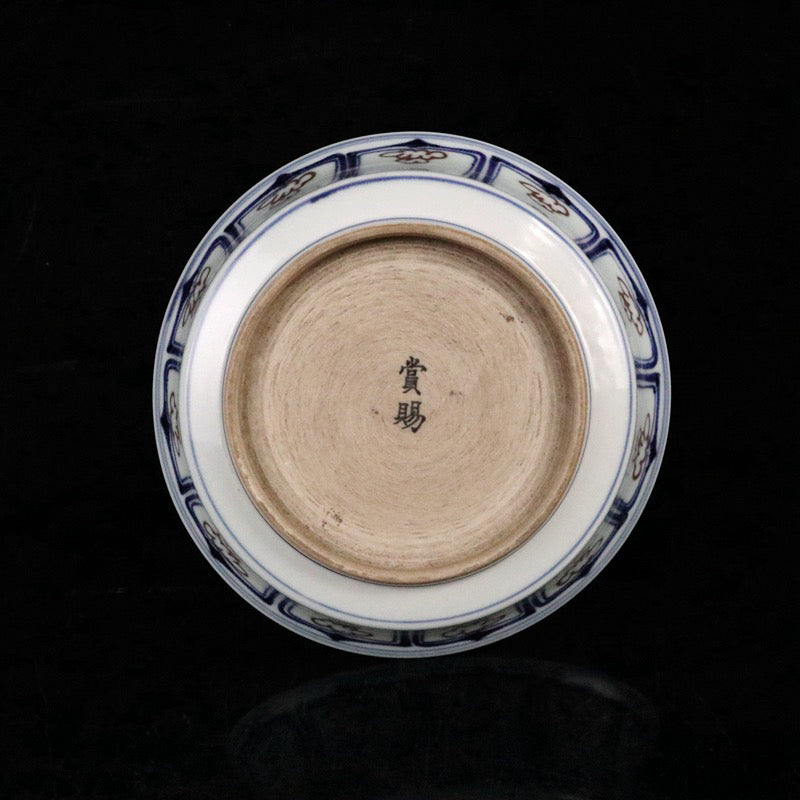 Blue and white glazed red auspicious beast pattern plate