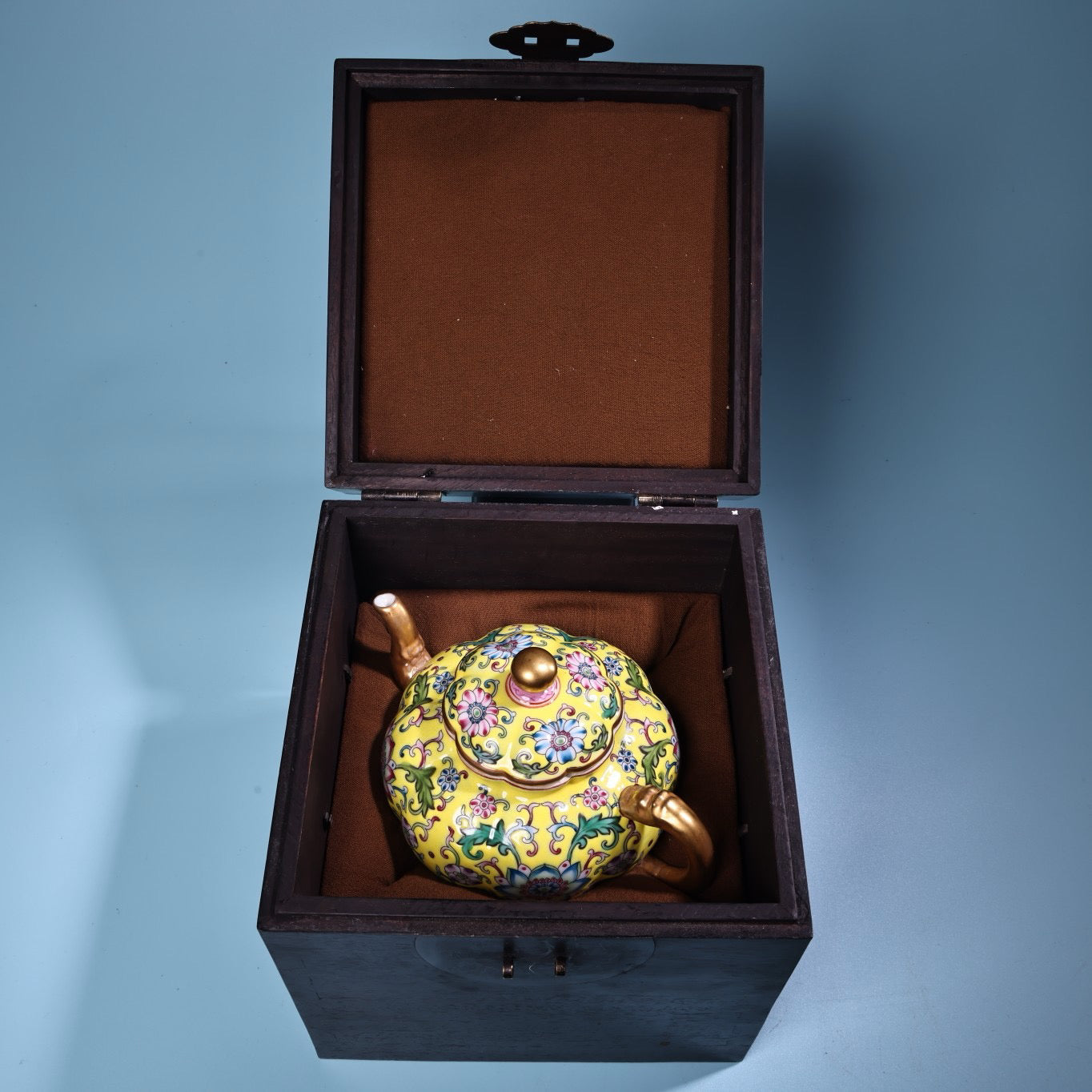 Enamel gilded gold colored porcelain teapot