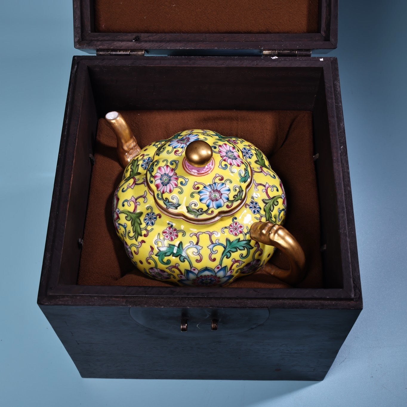 Enamel gilded gold colored porcelain teapot