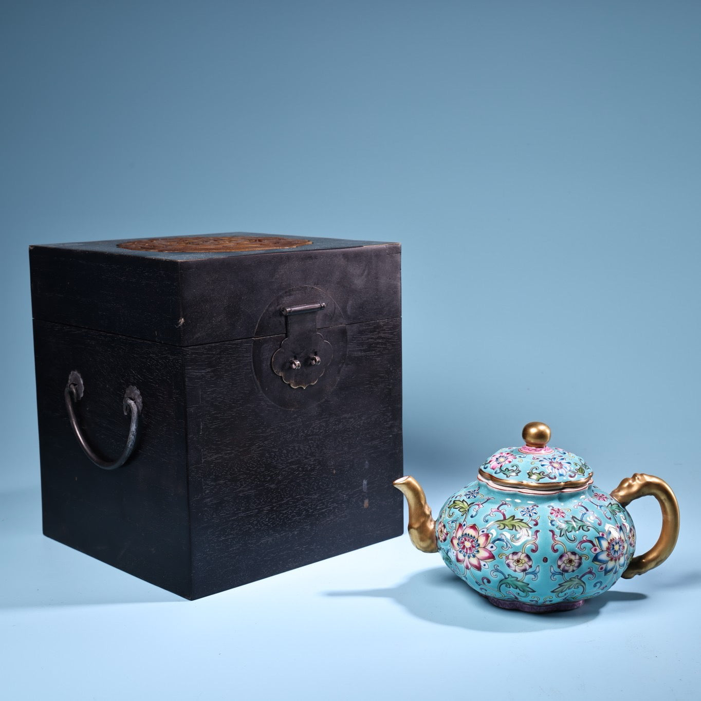 Enamel gilded gold colored porcelain teapot