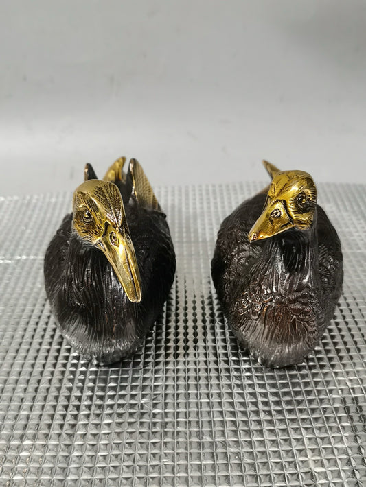 A pair of Chinese antique pure copper gilded mandarin ducks