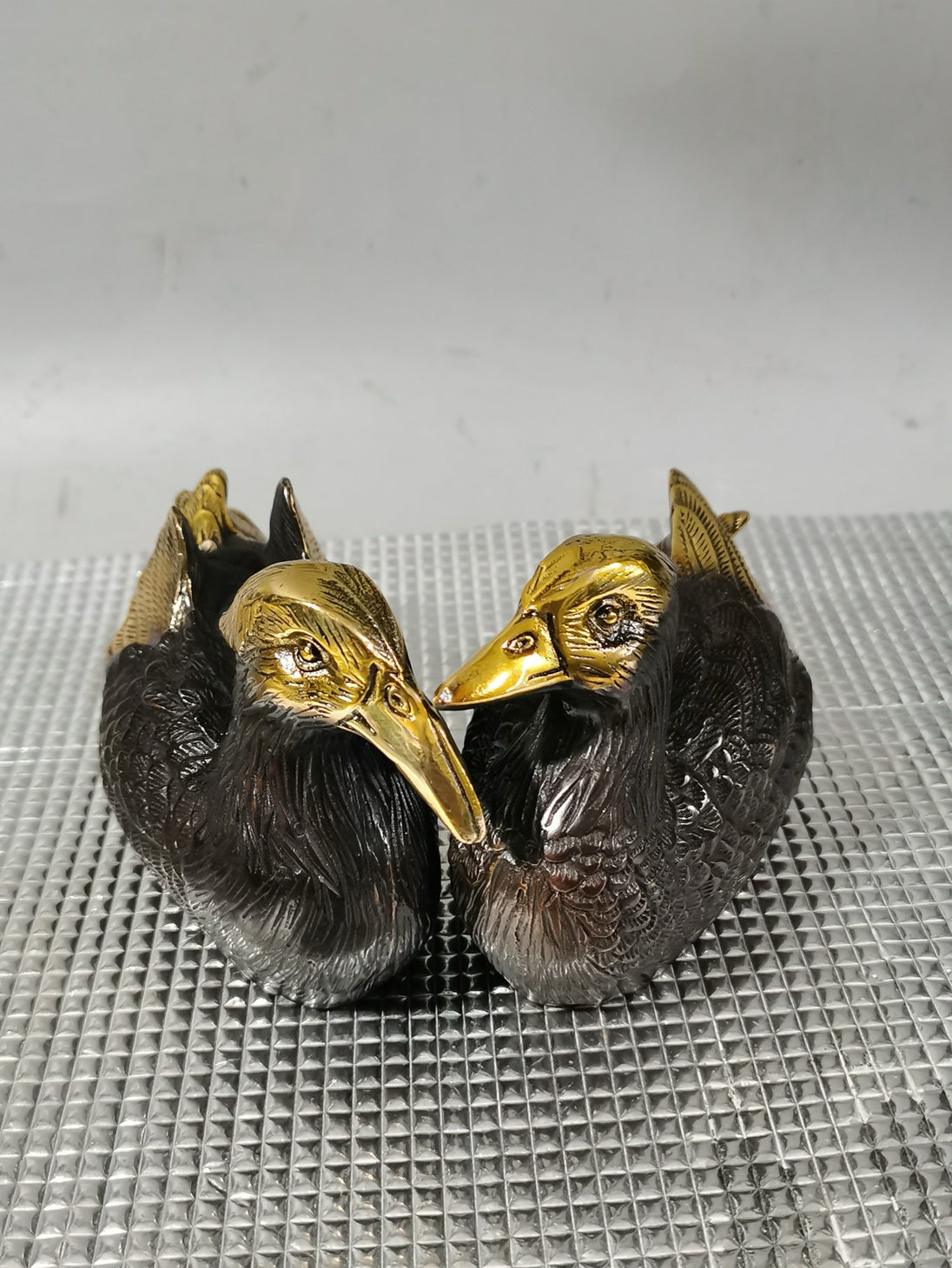 A pair of Chinese antique pure copper gilded mandarin ducks