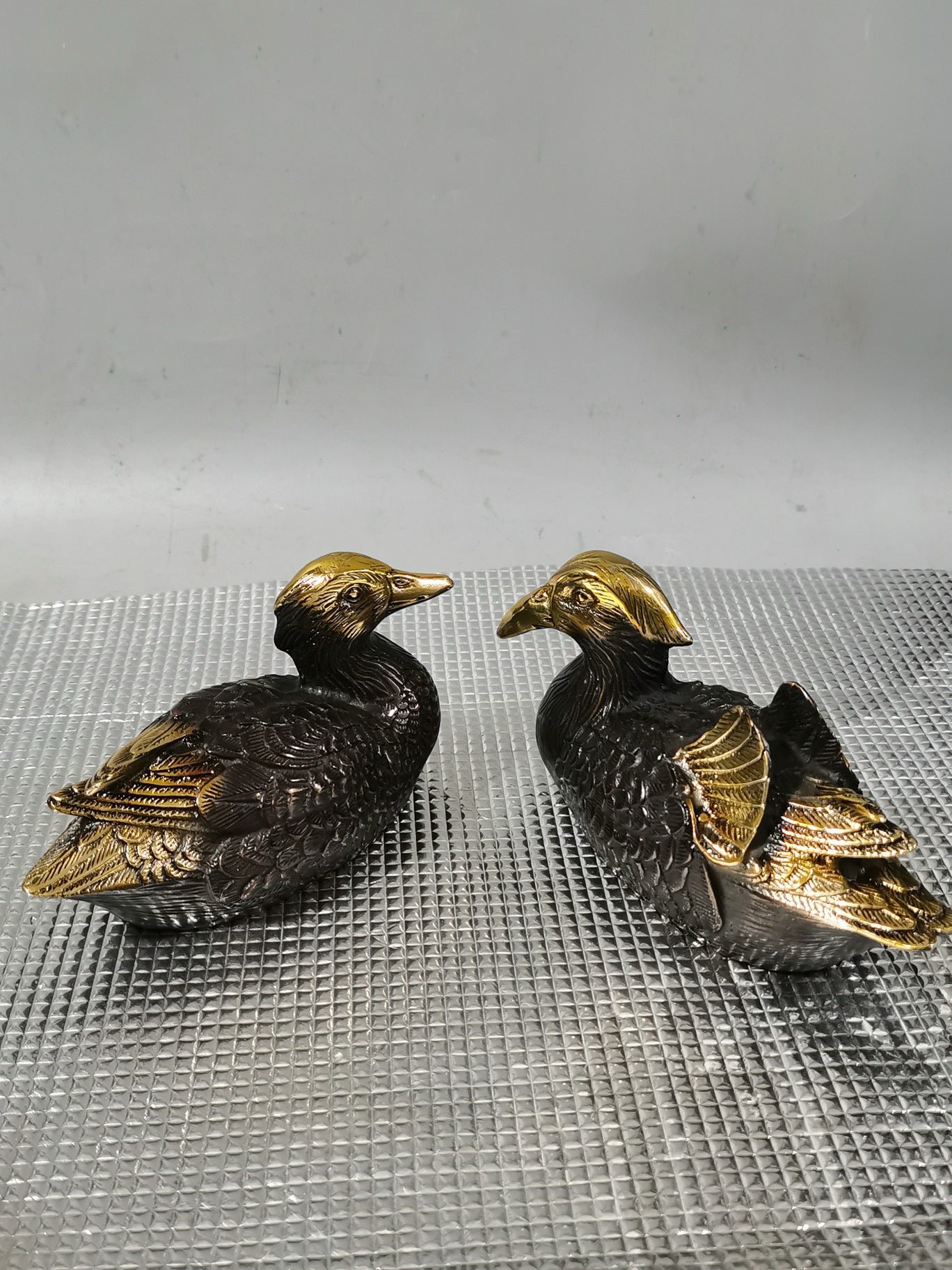 A pair of Chinese antique pure copper gilded mandarin ducks