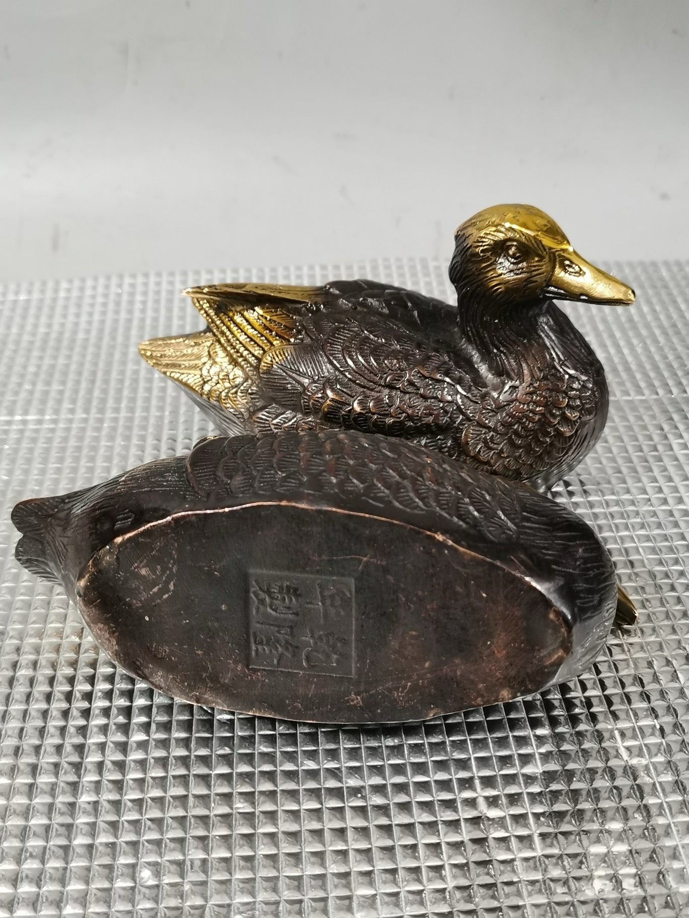 A pair of Chinese antique pure copper gilded mandarin ducks