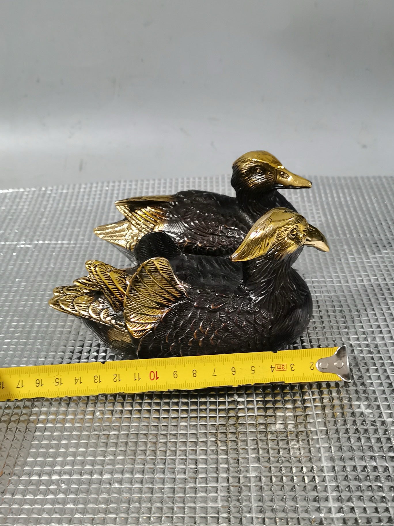 A pair of Chinese antique pure copper gilded mandarin ducks