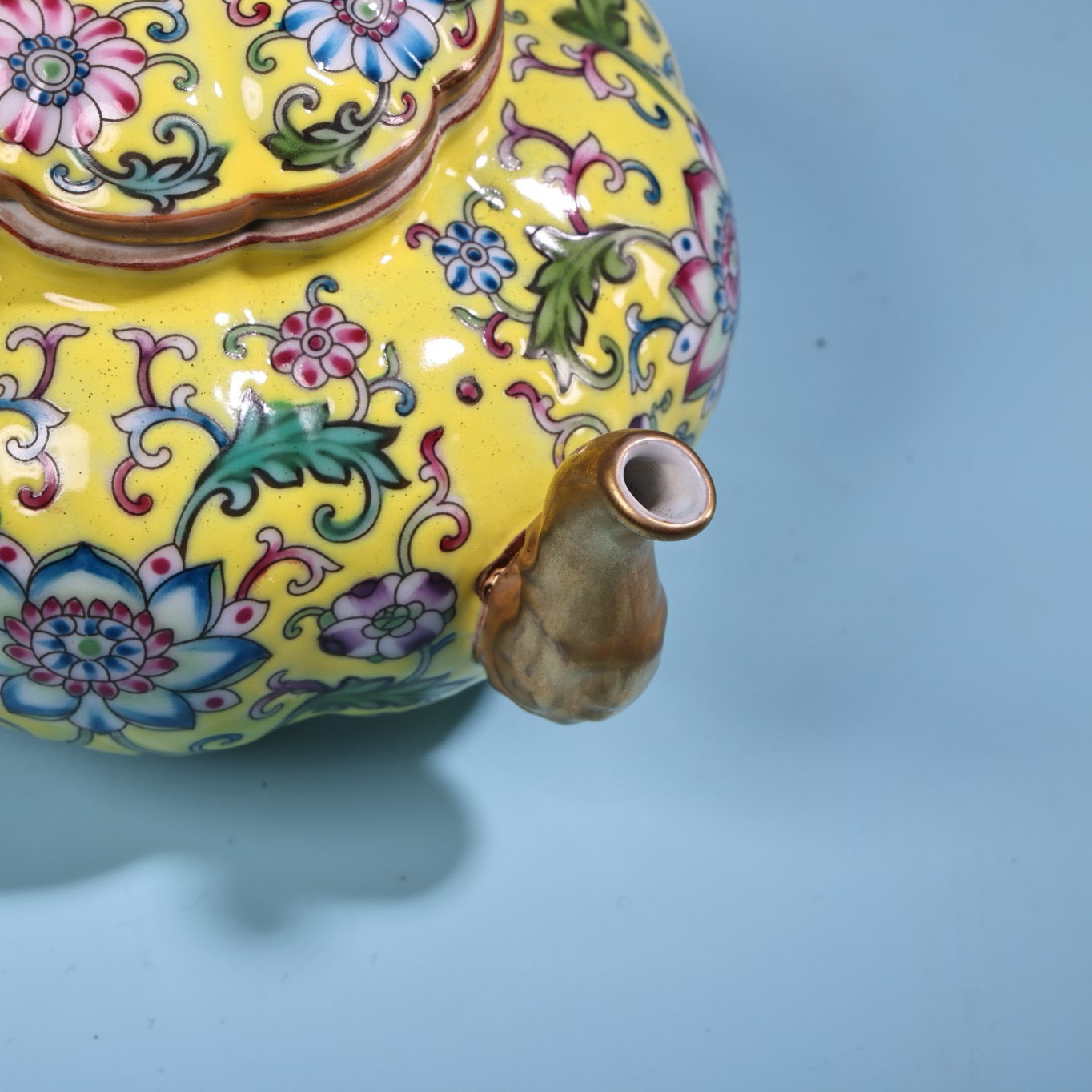 Enamel gilded gold colored porcelain teapot
