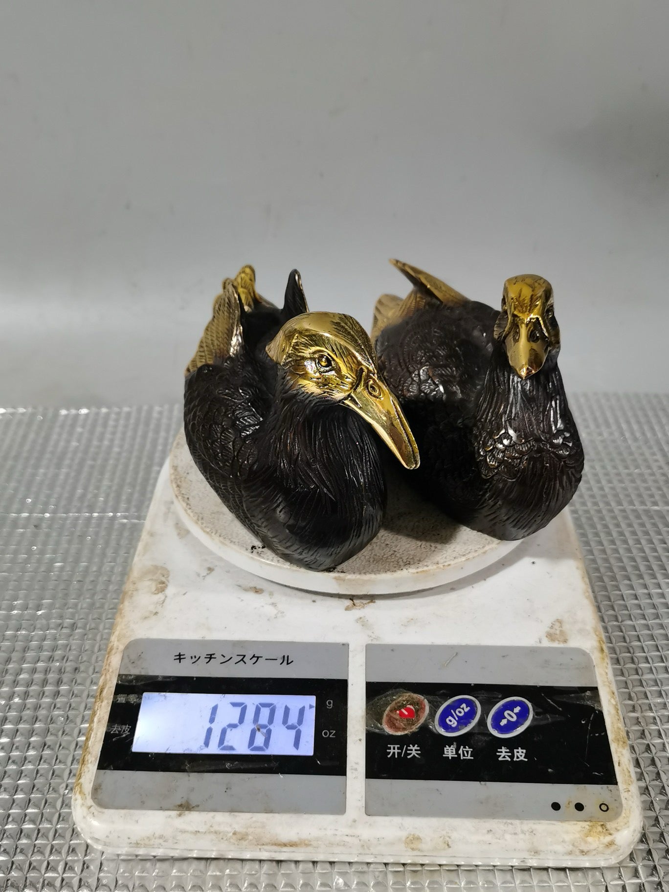 A pair of Chinese antique pure copper gilded mandarin ducks