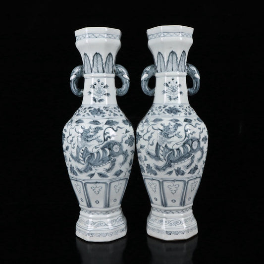 A pair of blue and white Kirin patterned elephant ear vases