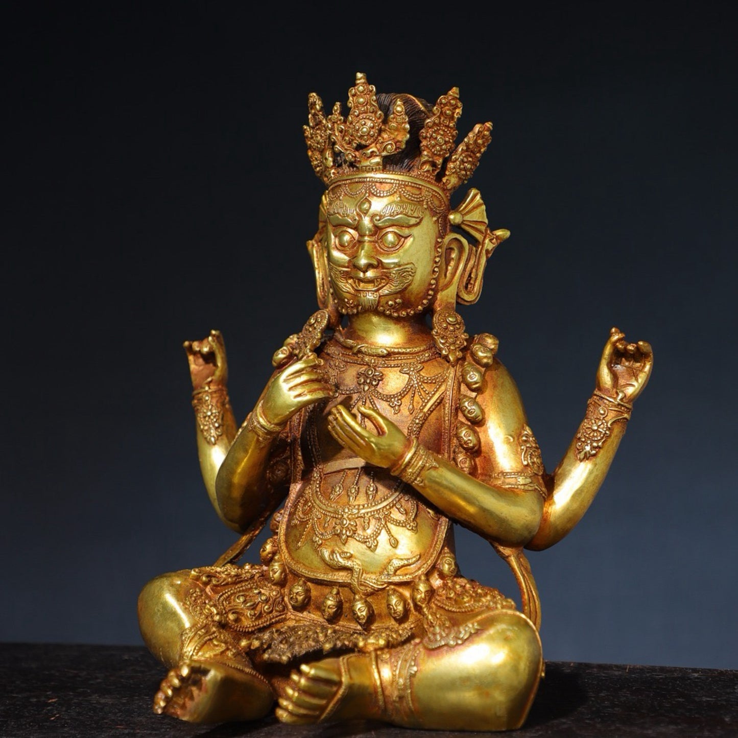 Pure copper four armed statue of the God of Wealth Buddha