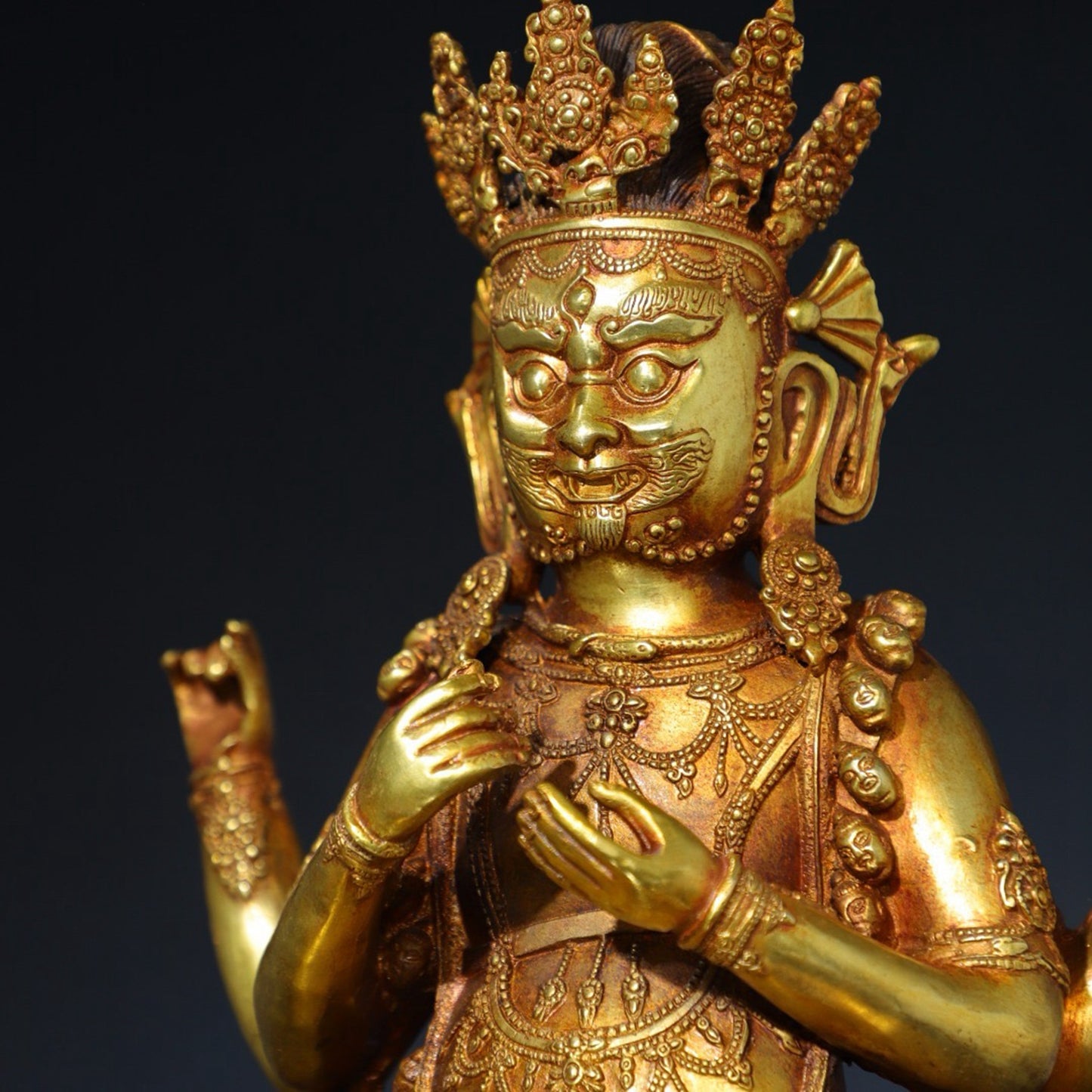 Pure copper four armed statue of the God of Wealth Buddha