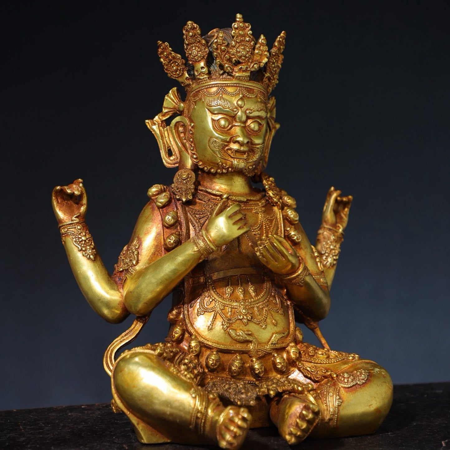 Pure copper four armed statue of the God of Wealth Buddha
