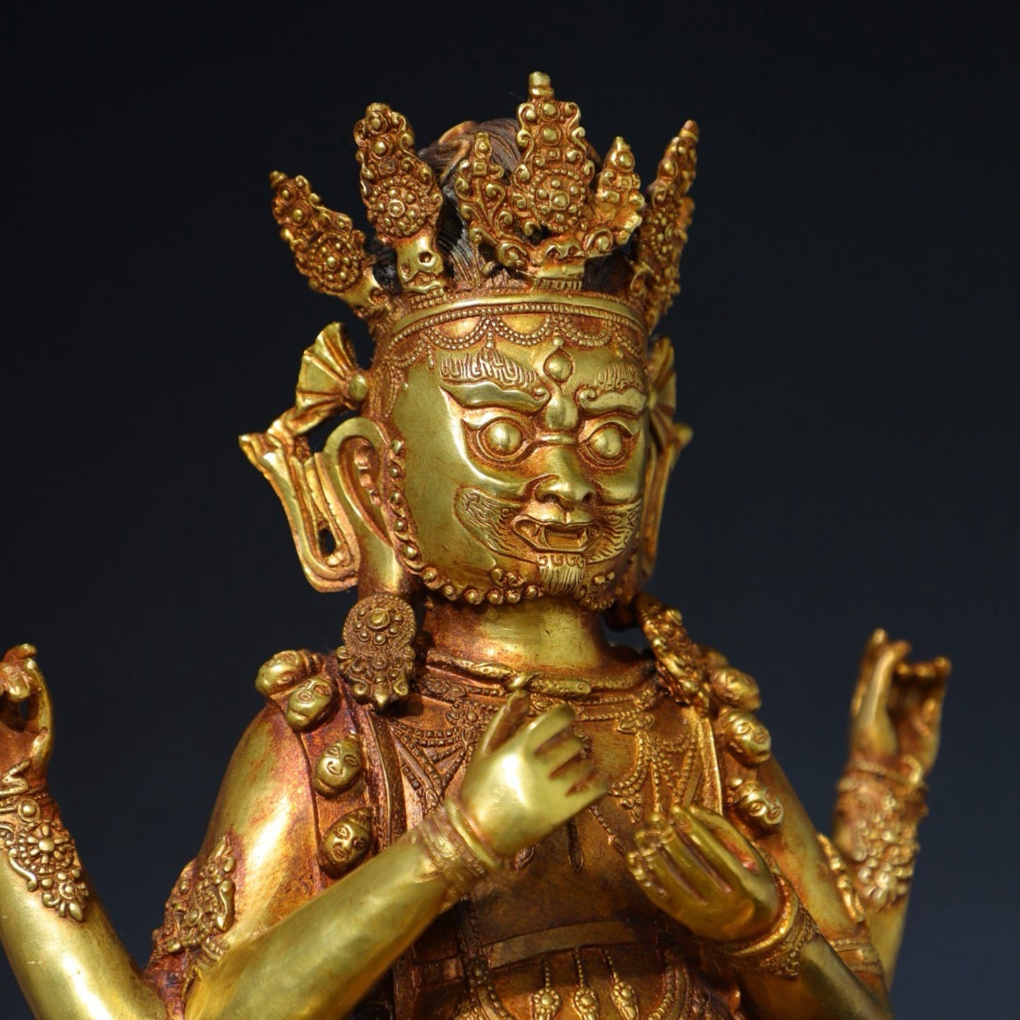 Pure copper four armed statue of the God of Wealth Buddha