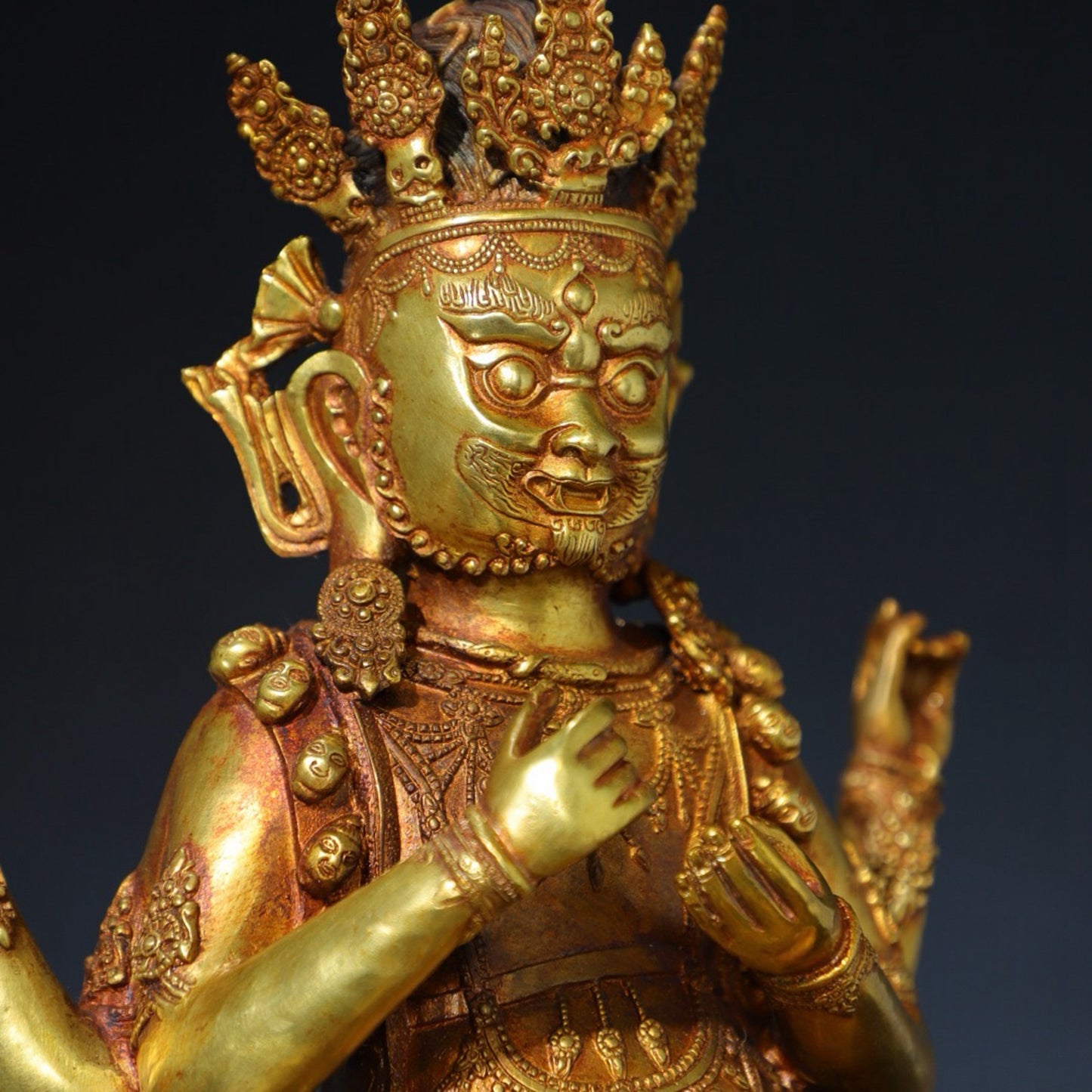 Pure copper four armed statue of the God of Wealth Buddha
