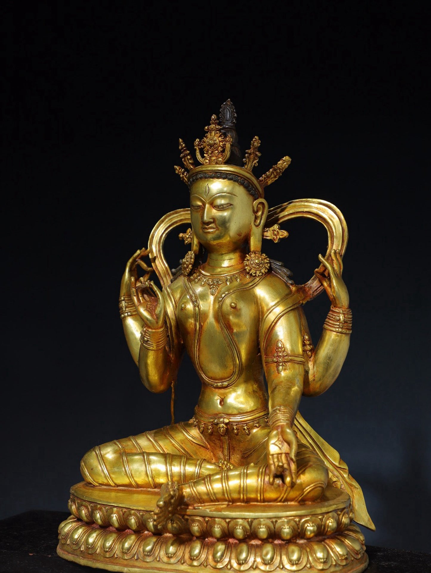 Pure copper four armed Tara Buddha statue