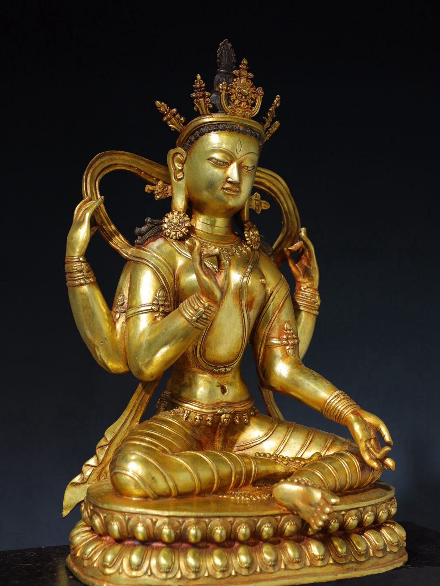 Pure copper four armed Tara Buddha statue
