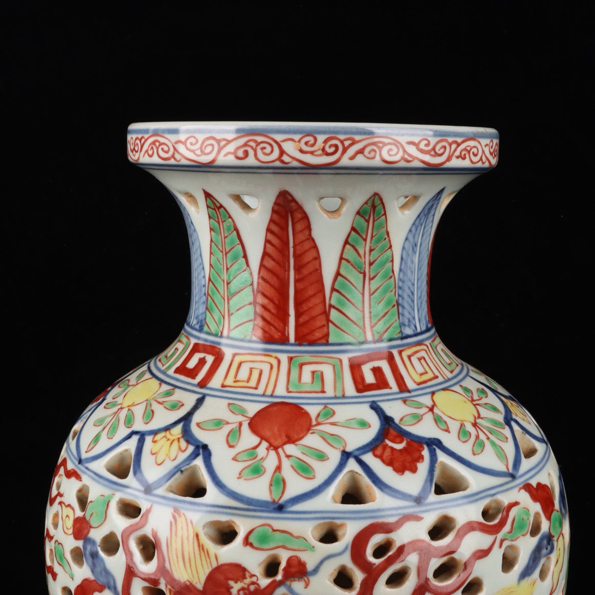 Blue and white hollowed out bottle with colorful Kirin pattern