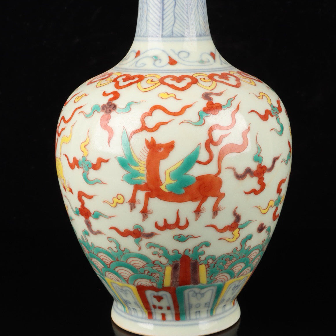 A pair of colorful Pegasus patterned bottles