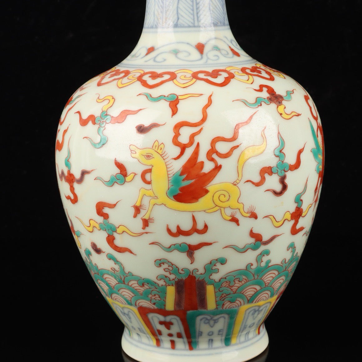 A pair of colorful Pegasus patterned bottles