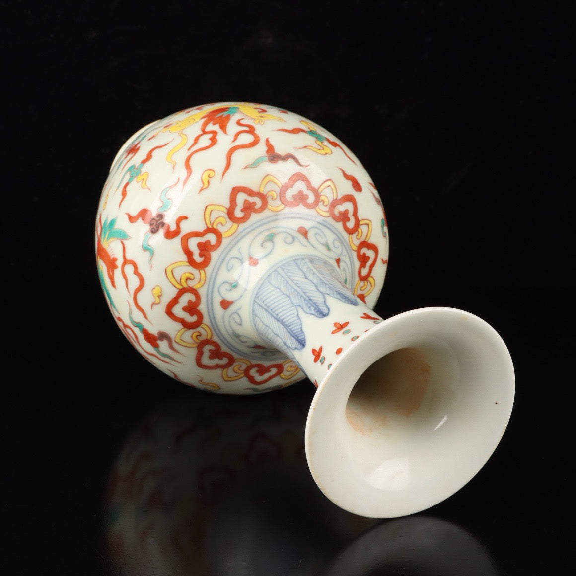 A pair of colorful Pegasus patterned bottles