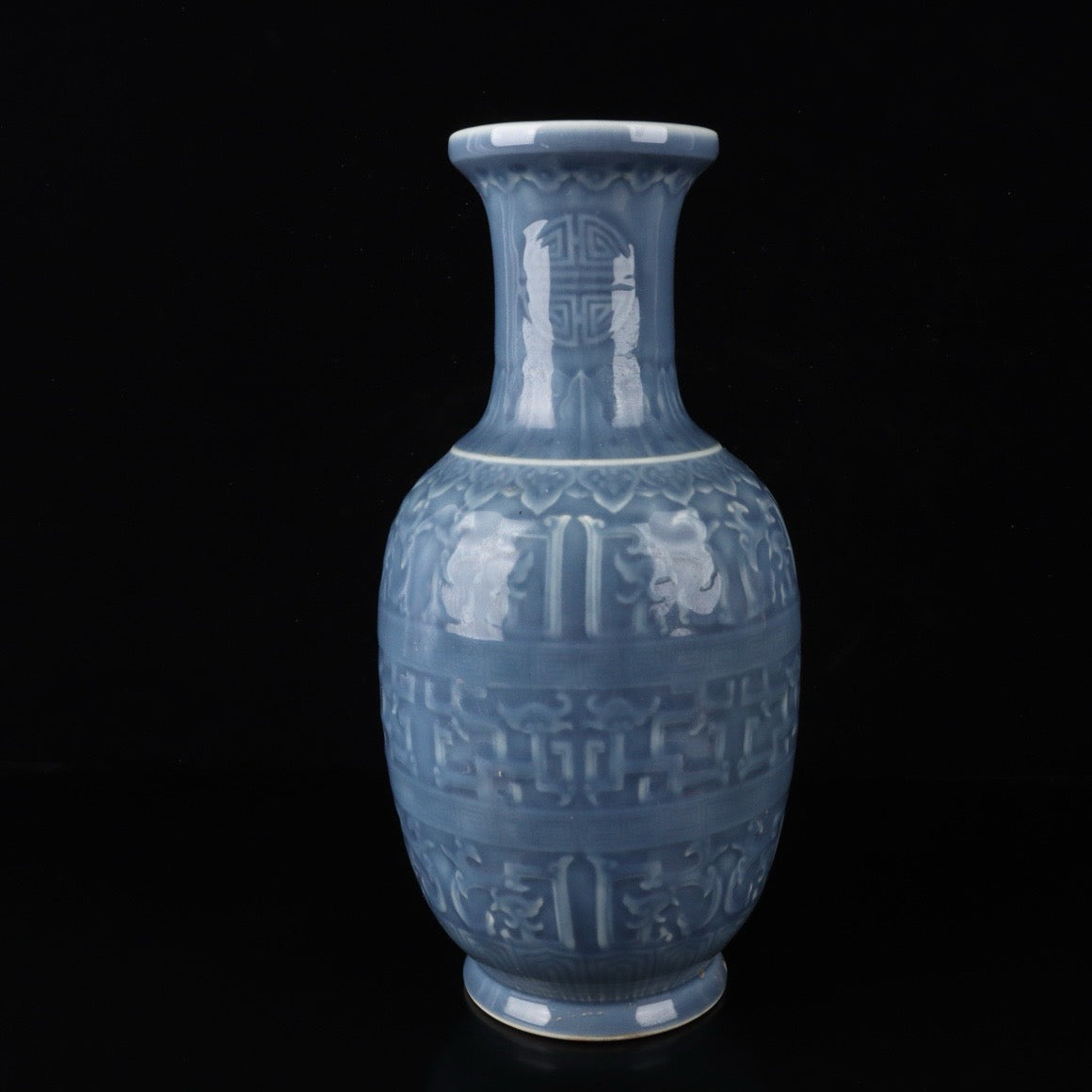 Monochrome glazed relief dragon vase
