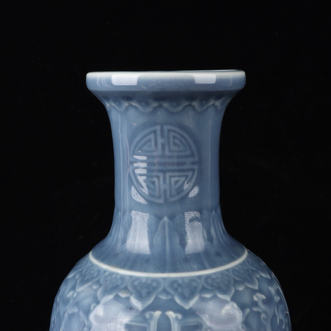 Monochrome glazed relief dragon vase