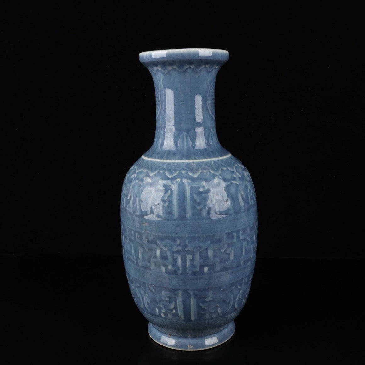 Monochrome glazed relief dragon vase