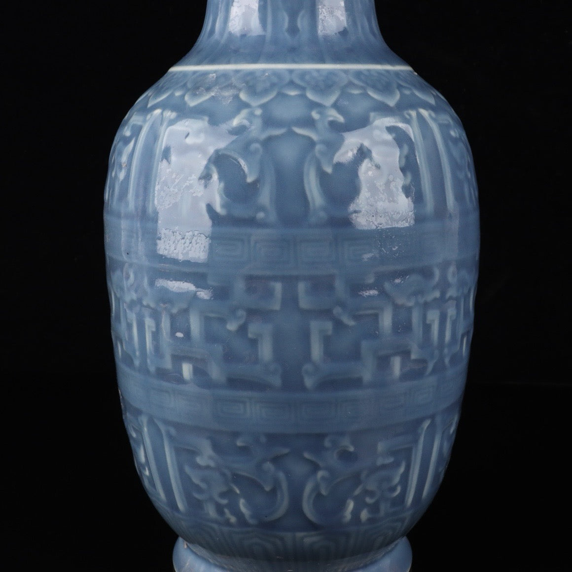 Monochrome glazed relief dragon vase