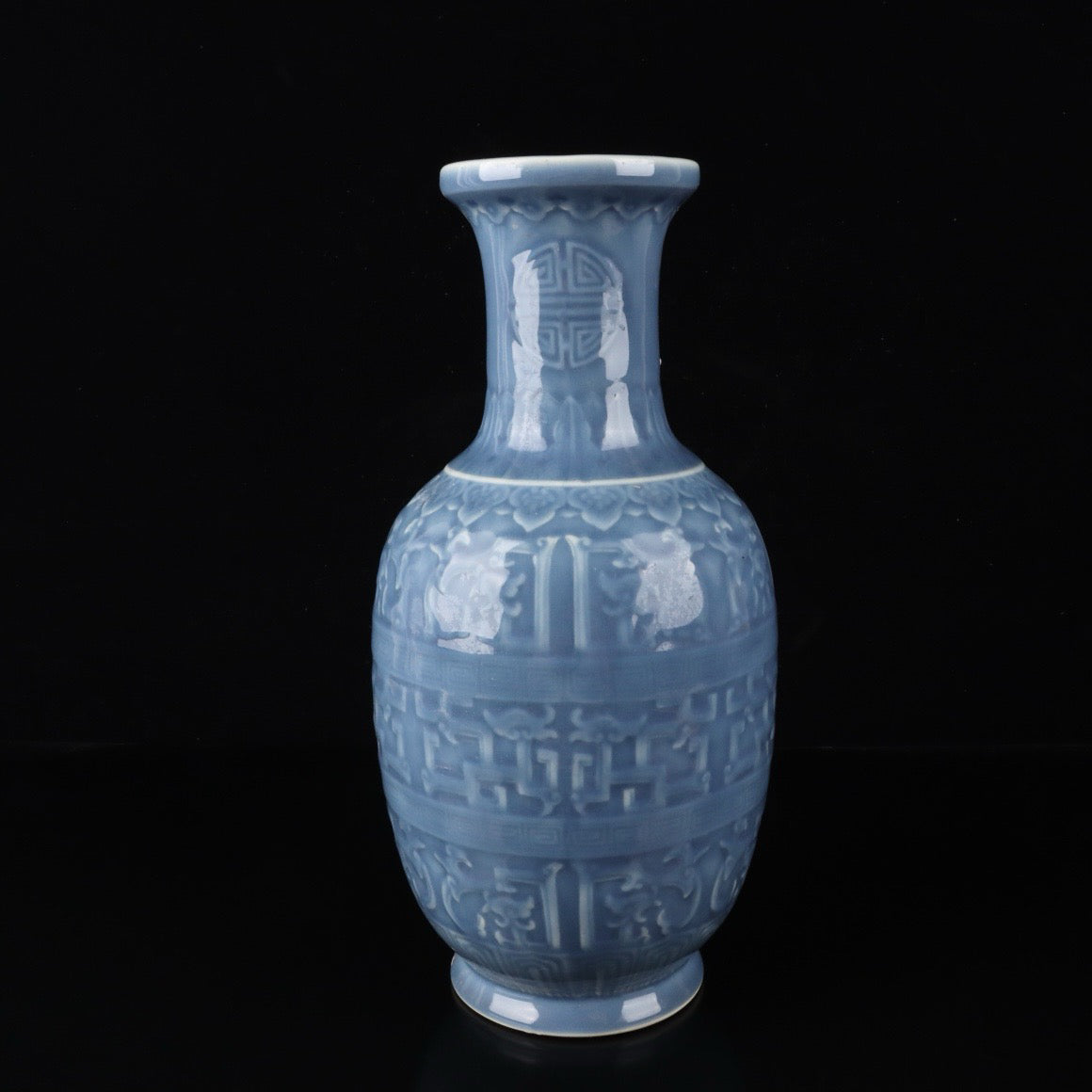 Monochrome glazed relief dragon vase