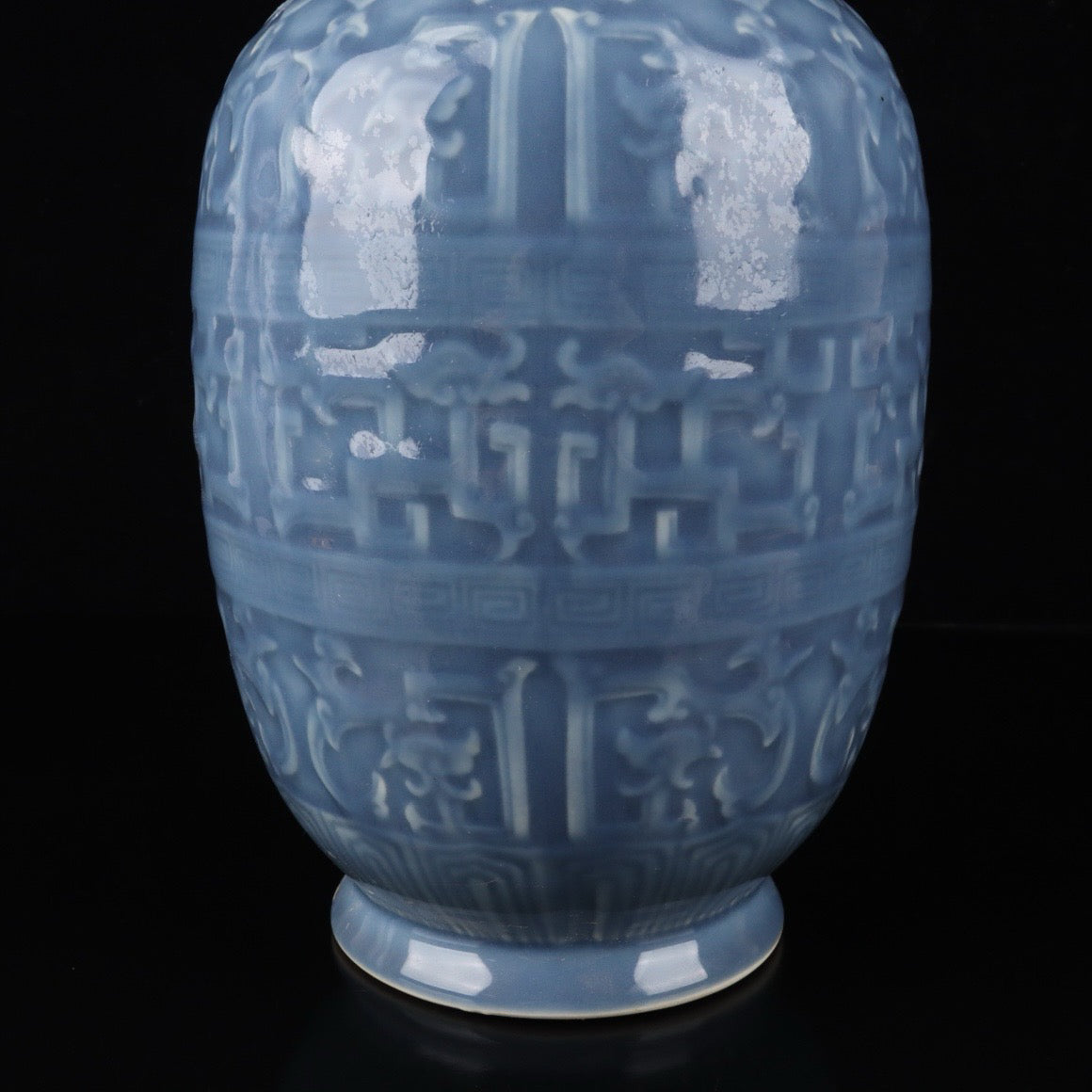 Monochrome glazed relief dragon vase