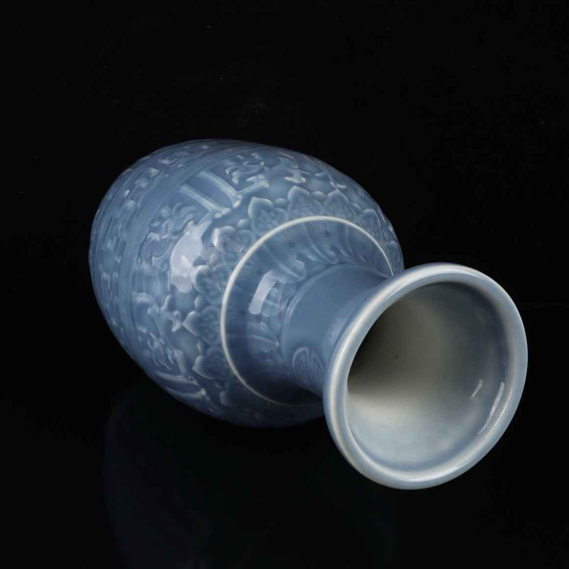 Monochrome glazed relief dragon vase