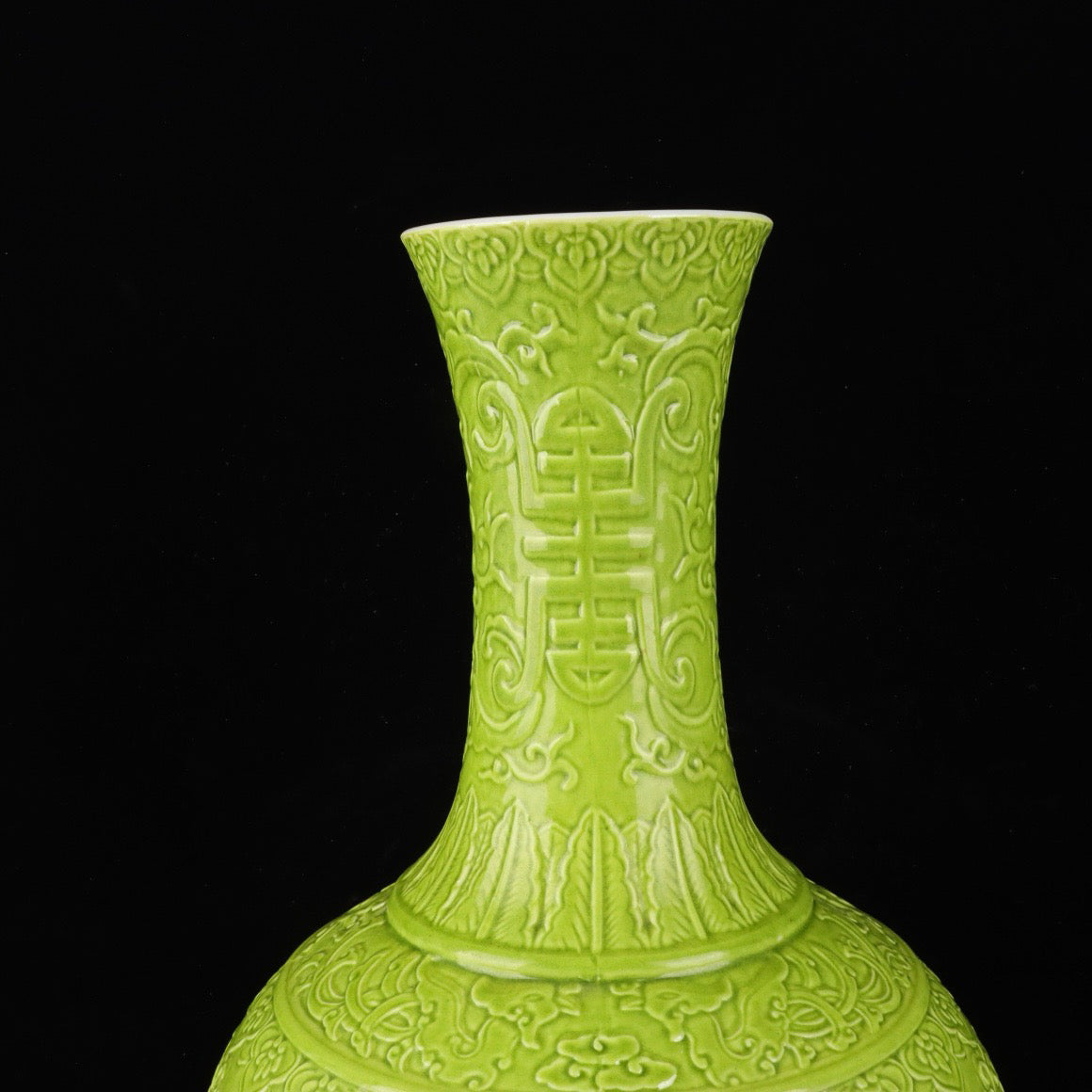 Monochrome glazed relief vase with auspicious dragon and phoenix patterns