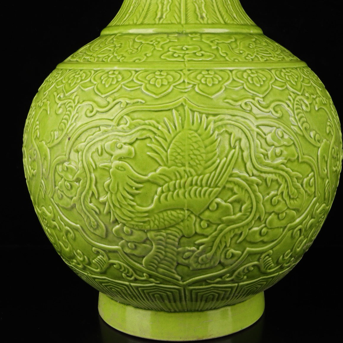 Monochrome glazed relief vase with auspicious dragon and phoenix patterns