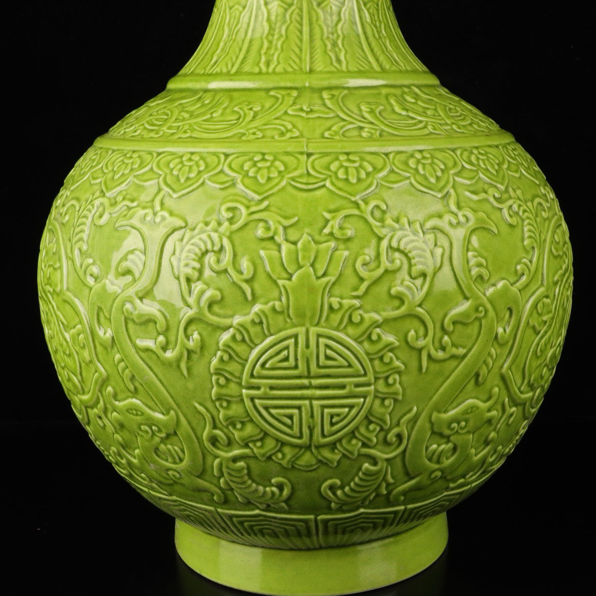 Monochrome glazed relief vase with auspicious dragon and phoenix patterns