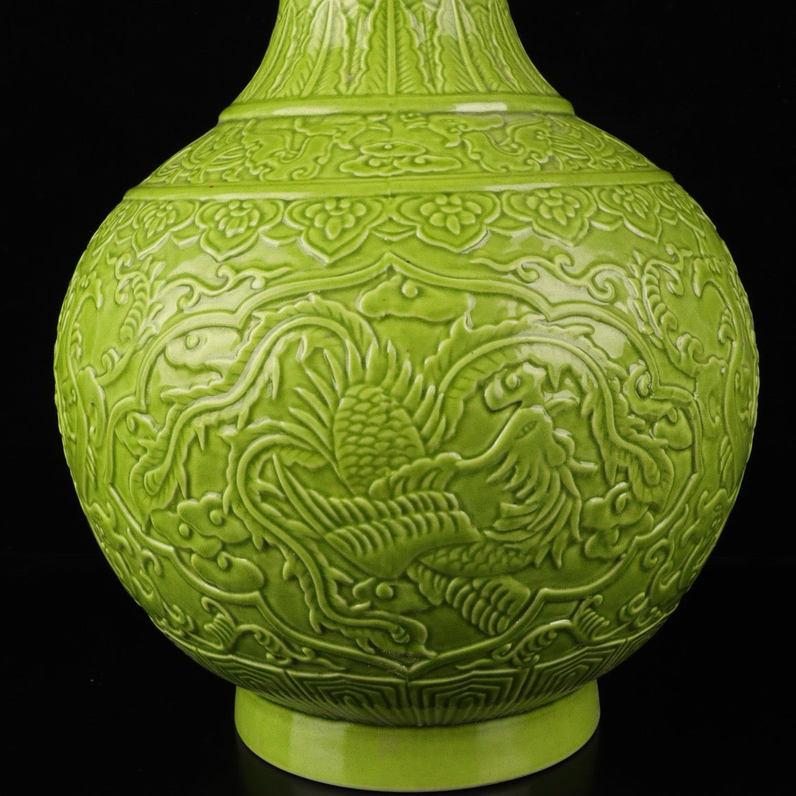 Monochrome glazed relief vase with auspicious dragon and phoenix patterns