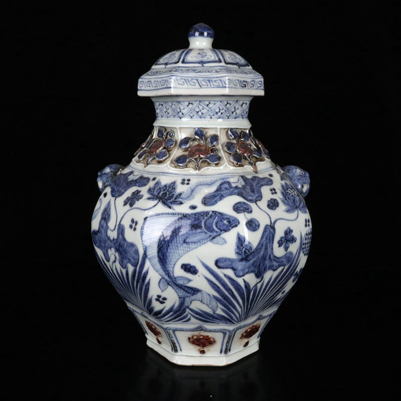 A pair of blue and white glazed, red pinched flower, fish and algae pattern, animal ear lid jars