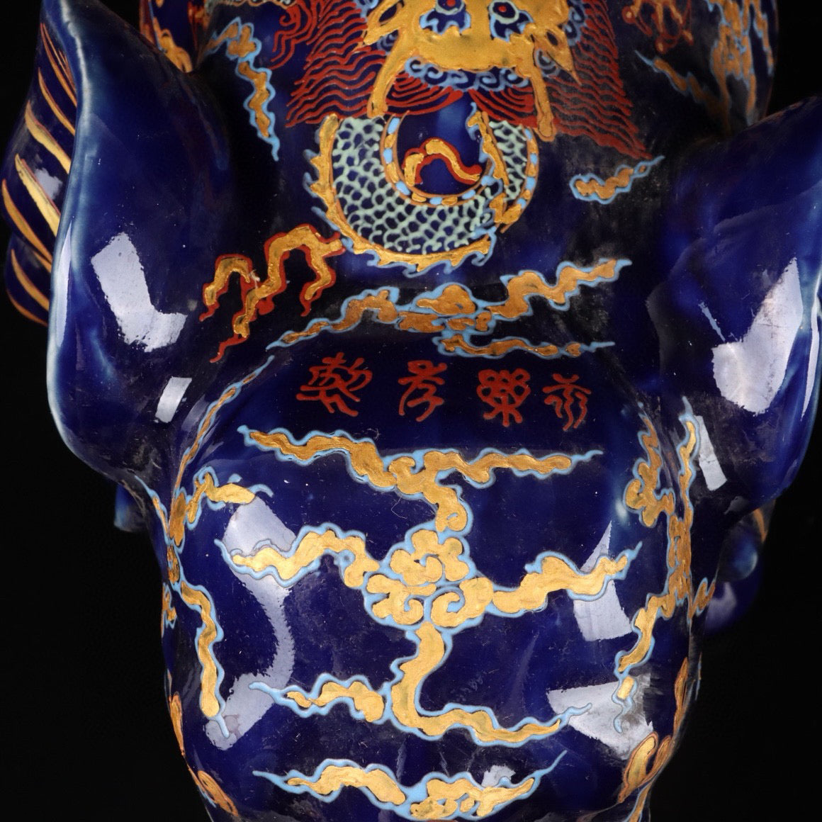 Elephant with colorful golden cloud and dragon patterns