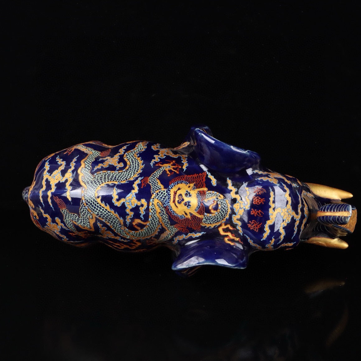 Elephant with colorful golden cloud and dragon patterns
