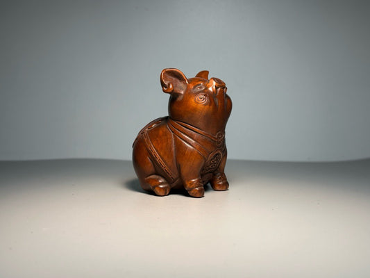 Chinese antique boxwood carving with exquisite craftsmanship, creating a lucky pig