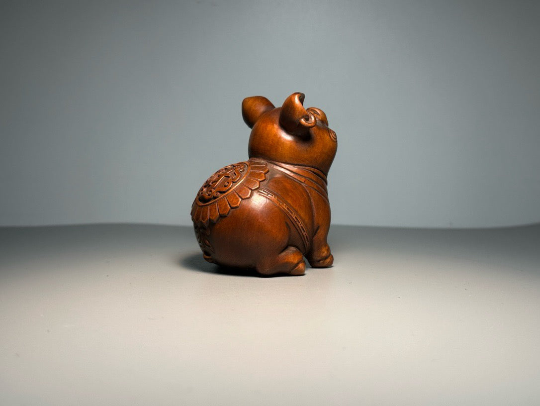 Chinese antique boxwood carving with exquisite craftsmanship, creating a lucky pig