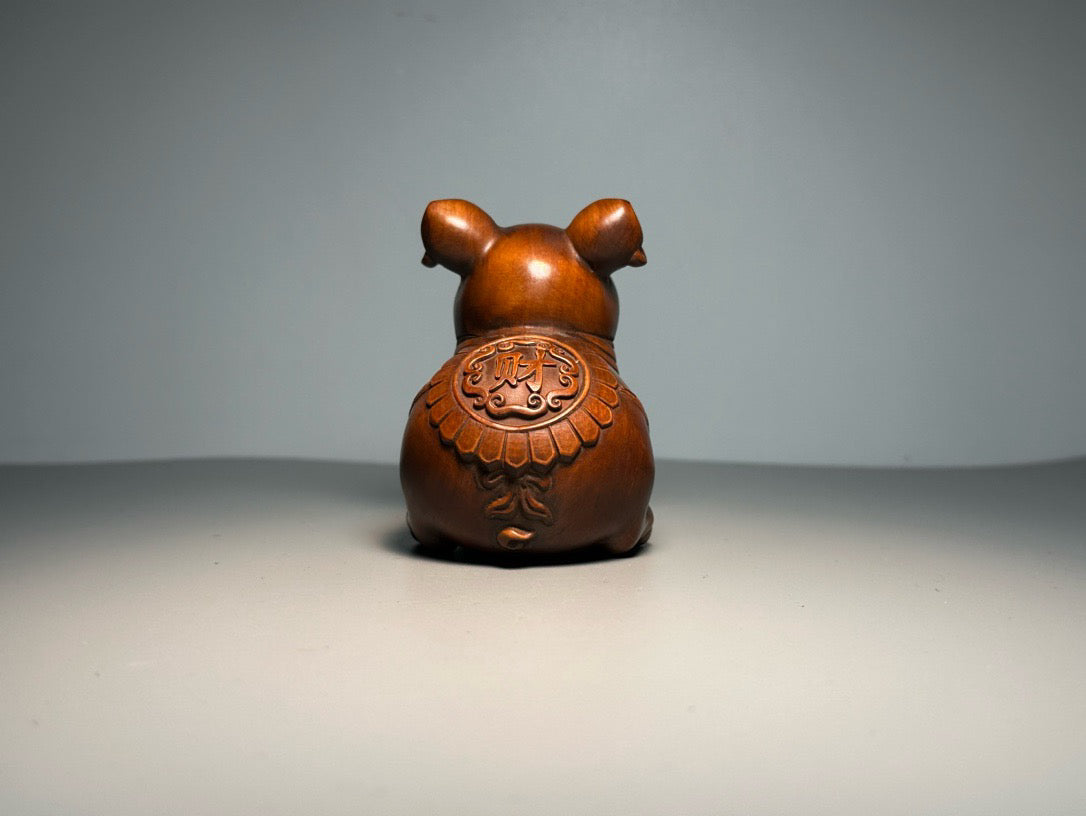 Chinese antique boxwood carving with exquisite craftsmanship, creating a lucky pig
