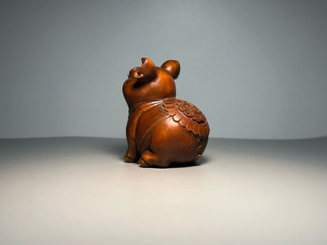 Chinese antique boxwood carving with exquisite craftsmanship, creating a lucky pig
