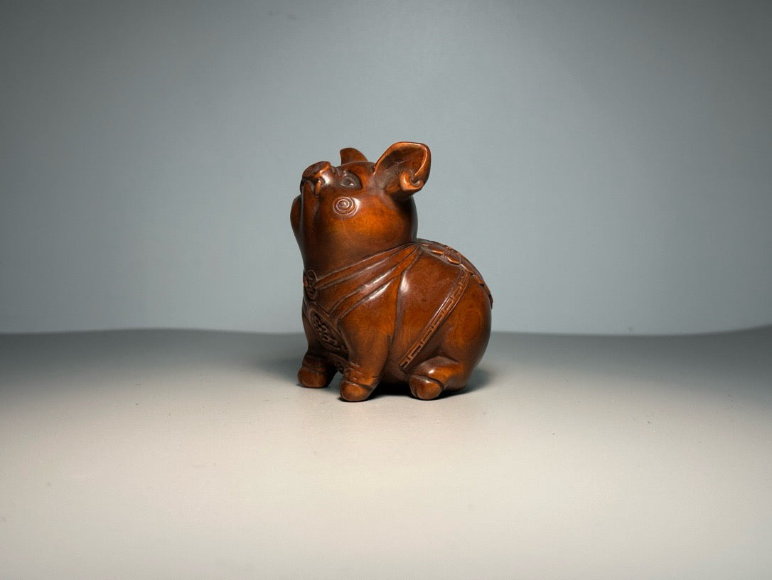 Chinese antique boxwood carving with exquisite craftsmanship, creating a lucky pig