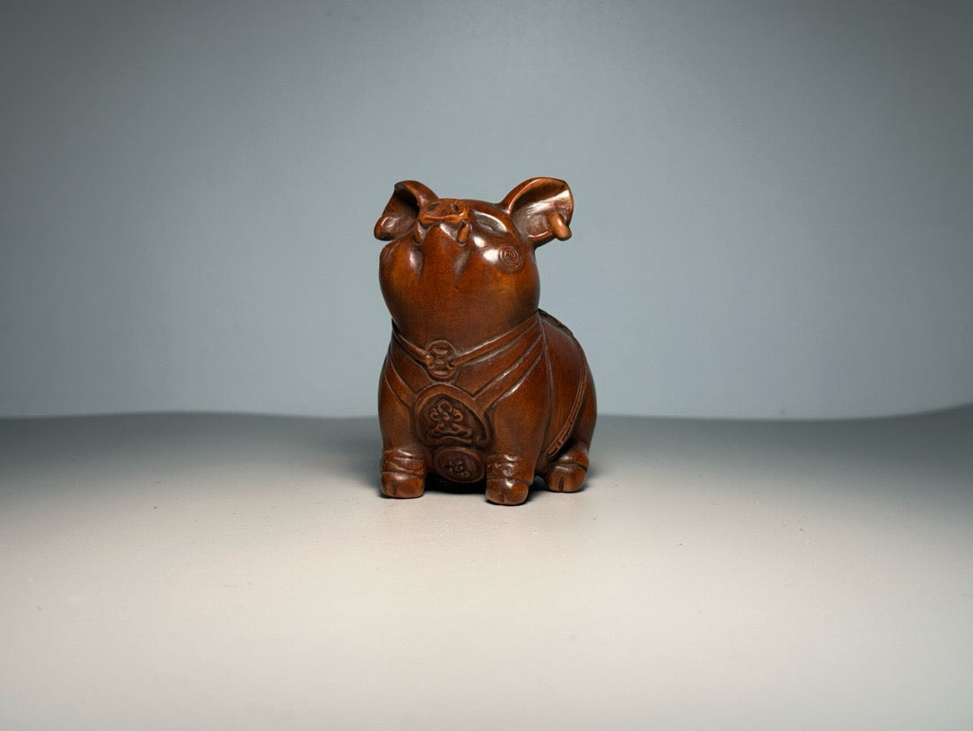 Chinese antique boxwood carving with exquisite craftsmanship, creating a lucky pig