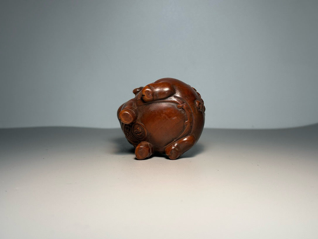 Chinese antique boxwood carving with exquisite craftsmanship, creating a lucky pig