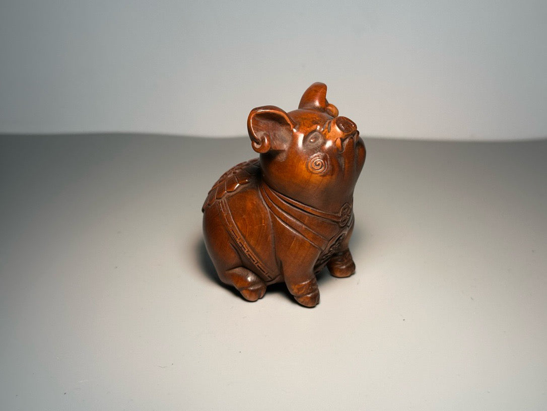 Chinese antique boxwood carving with exquisite craftsmanship, creating a lucky pig