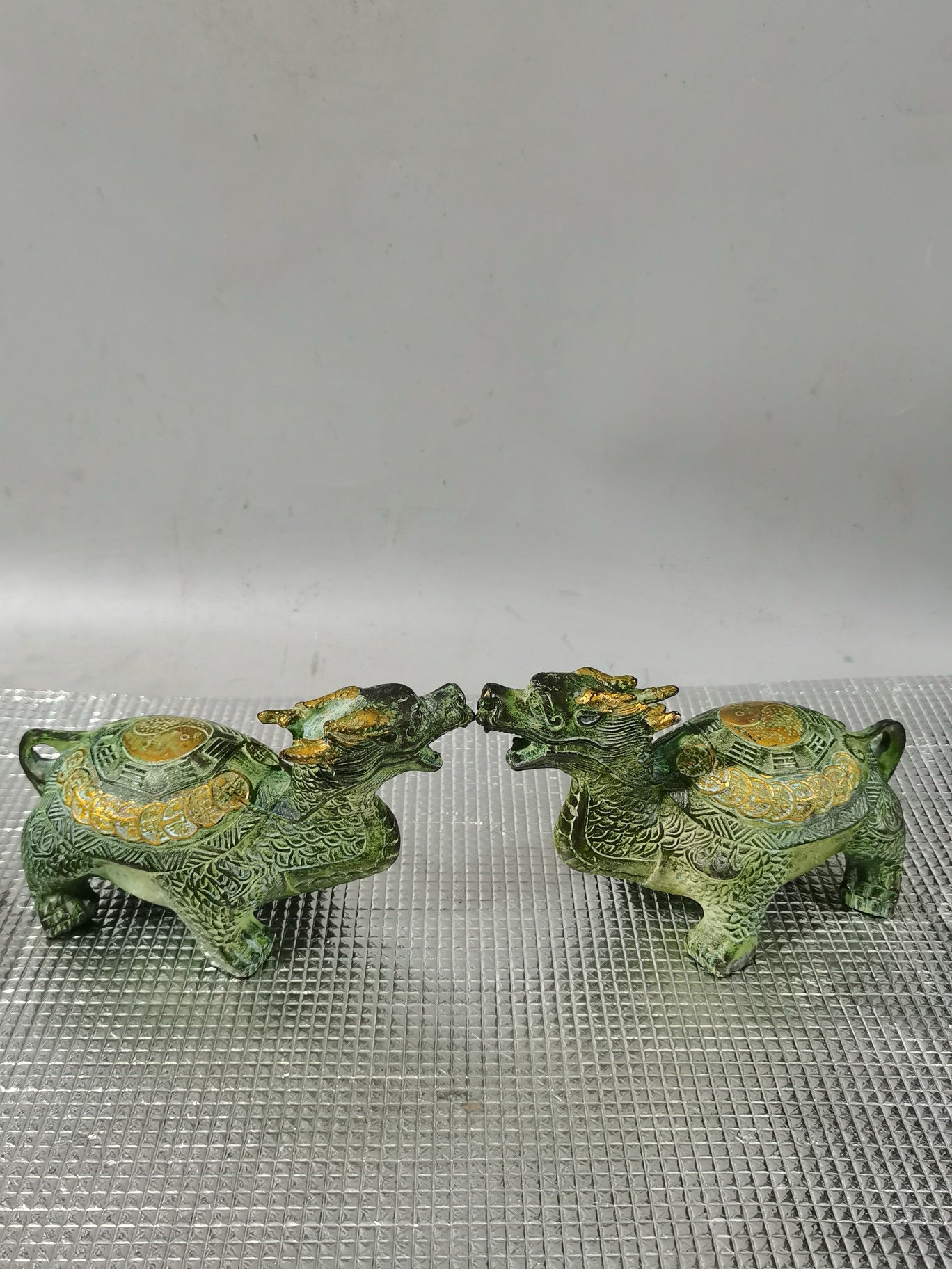 A pair of pure copper dragon turtle ornaments