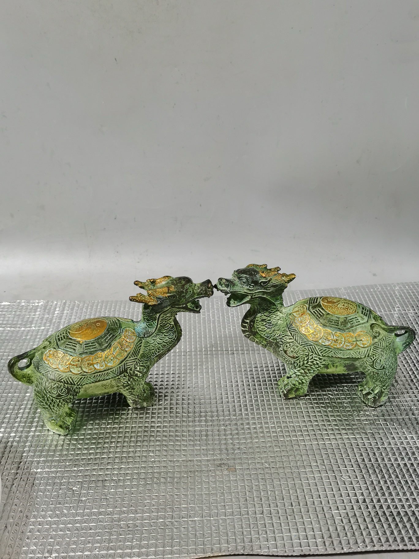 A pair of pure copper dragon turtle ornaments