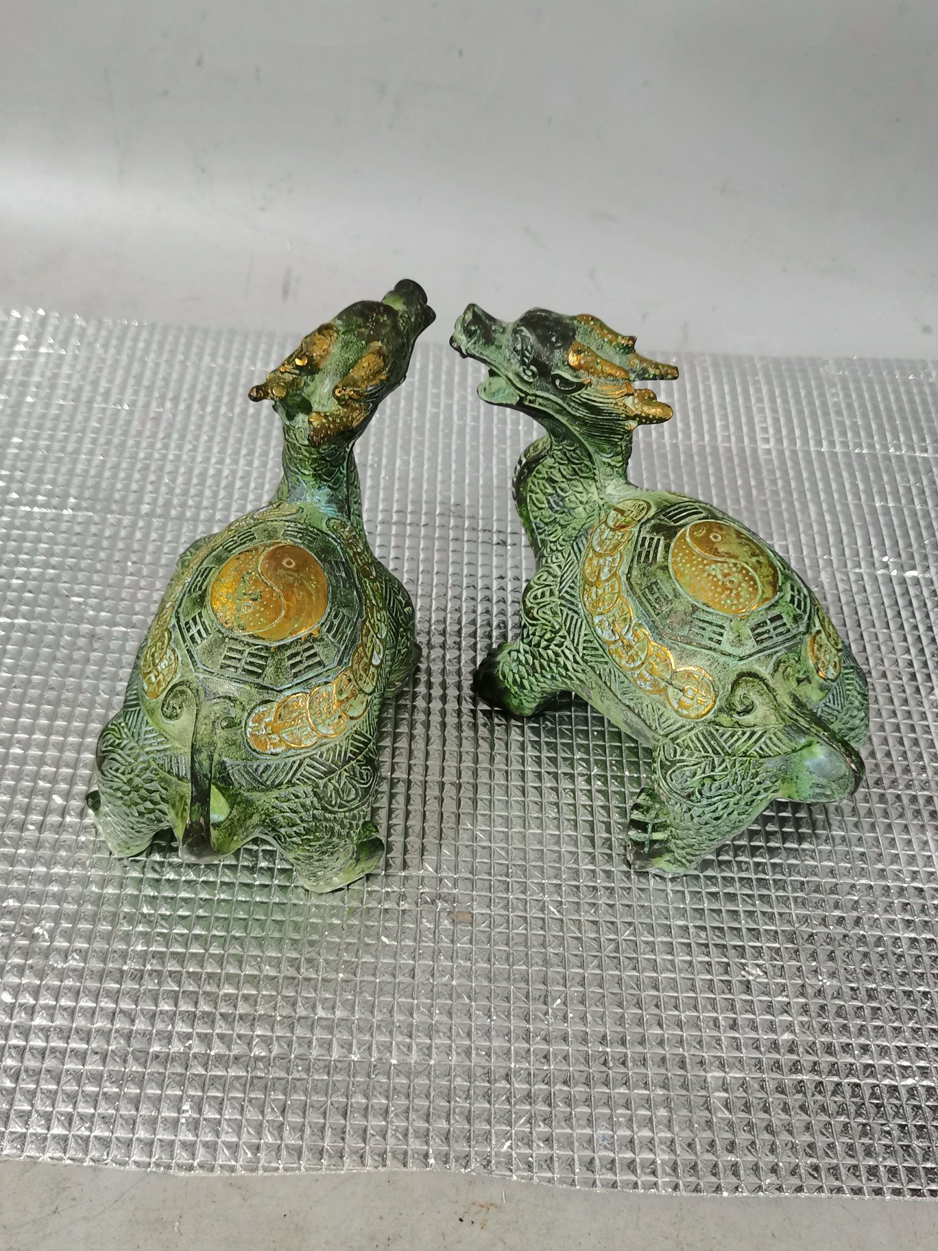 A pair of pure copper dragon turtle ornaments